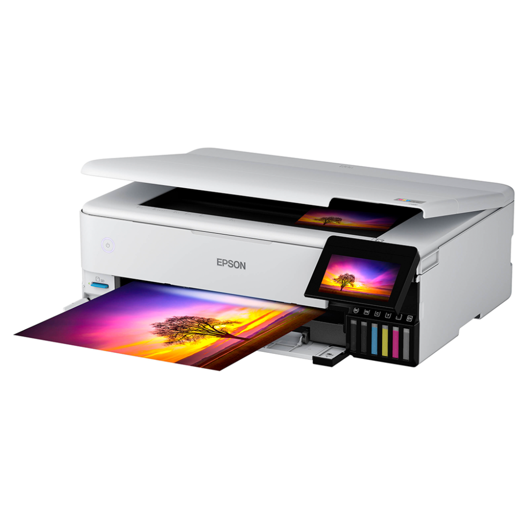 Epson EcoTank Photo ET-8550 printer with colorful prints on a white background.