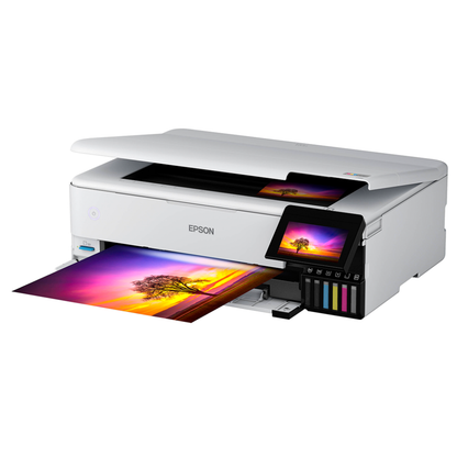Epson EcoTank Photo ET-8550 printer with colorful prints on a white background.