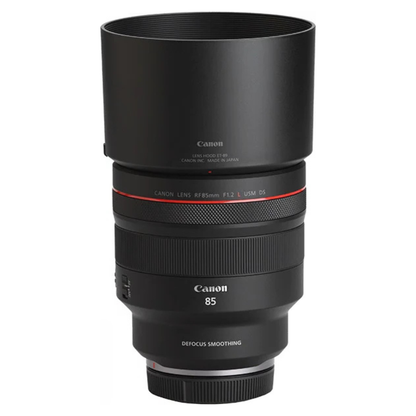 Side view of the Canon RF 85mm f/1.2L USM DS Lens with lens hood fitted, on a white background.